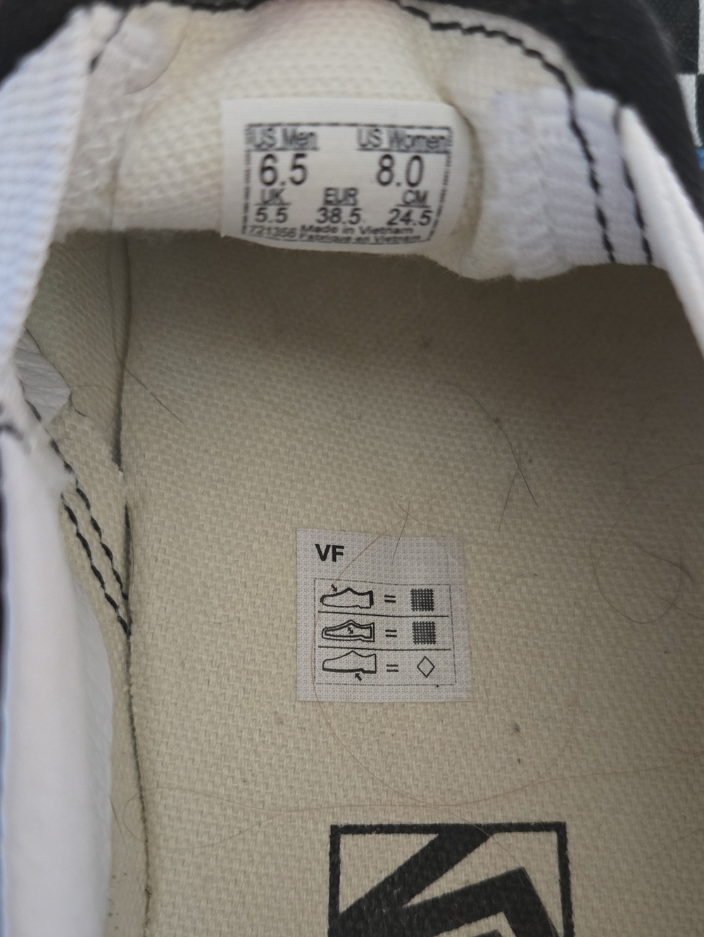 Vans Black & White Checkerboard Slip-Ons with Blue Butterfly Print - Picture 6 of 6